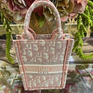 Christian Dior mini crossbody. Pink, gray and lavender in color